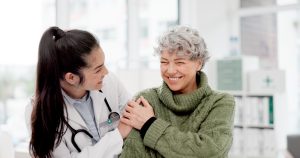 Female doctor consulting with her female patient.